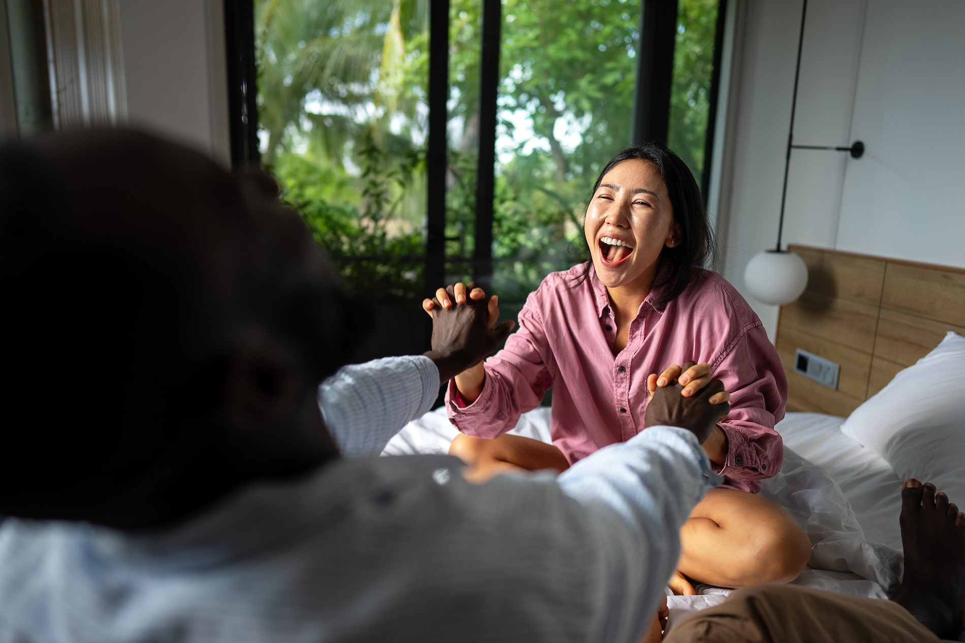 Couple smiling and connecting during a couples counselling session