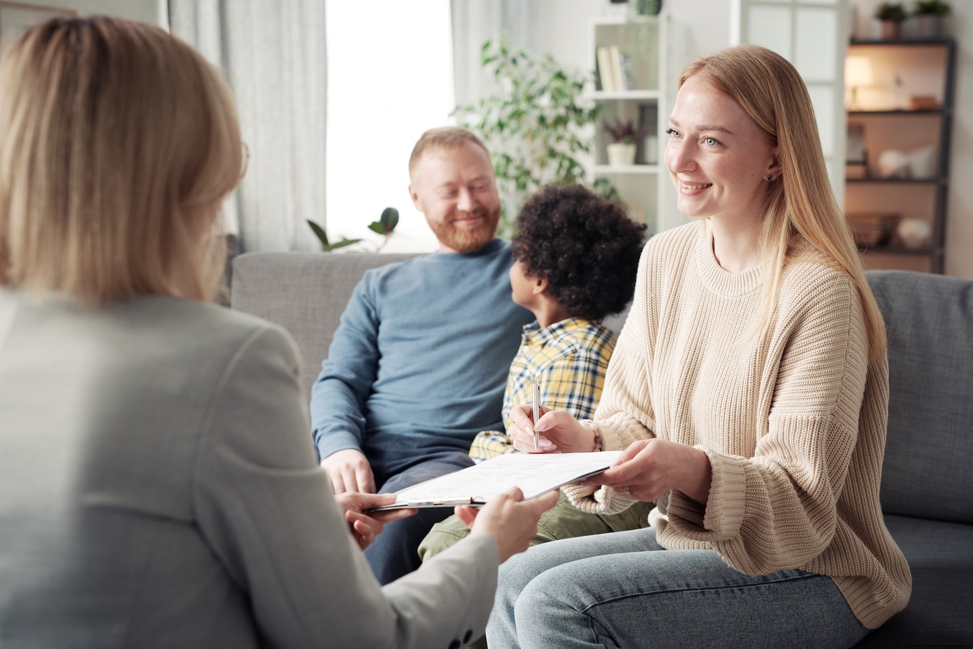 family Counselling parents with a child talking to therapist